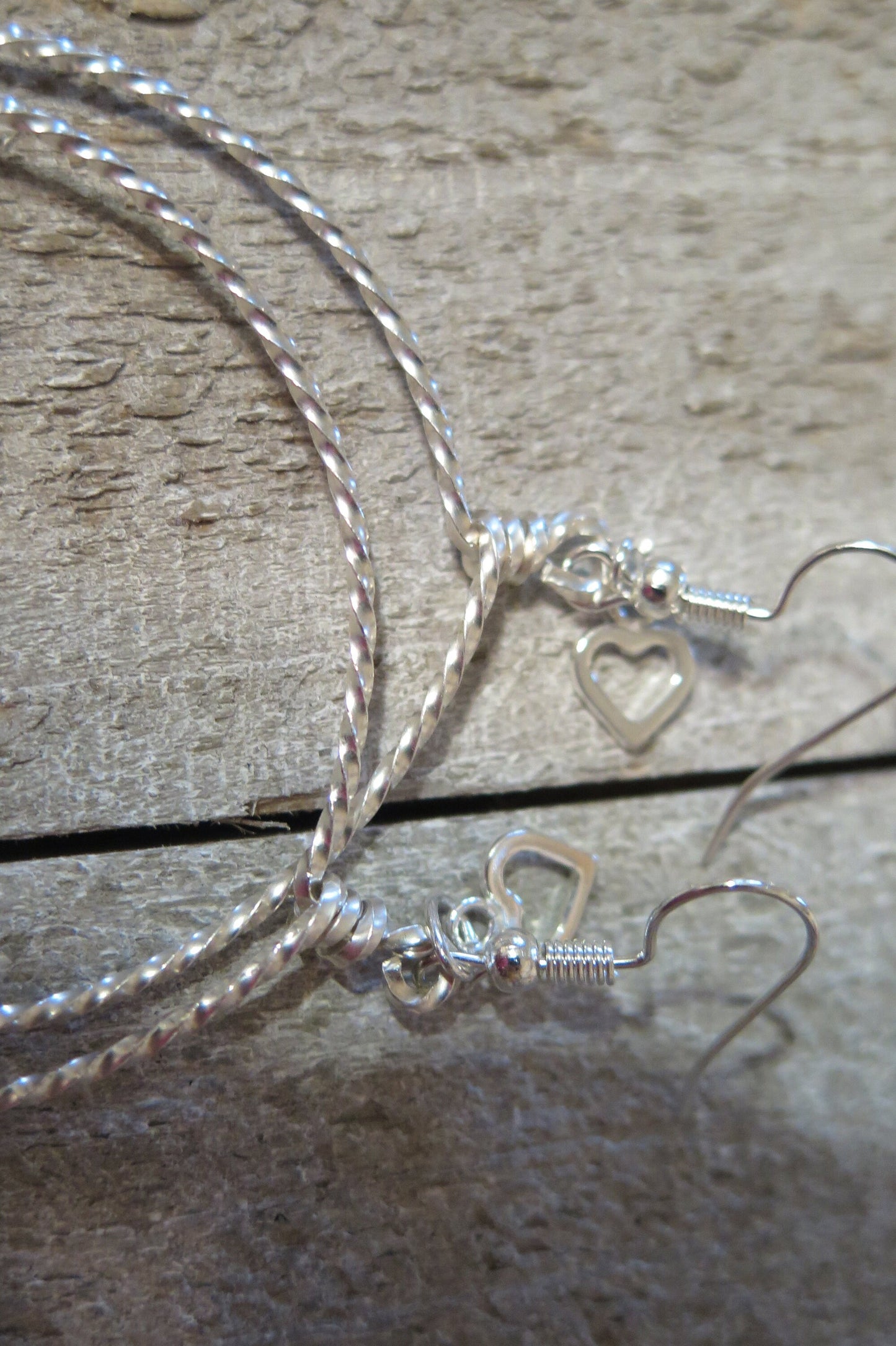 Twisted Sterling Silver Hoops with Heart Accent